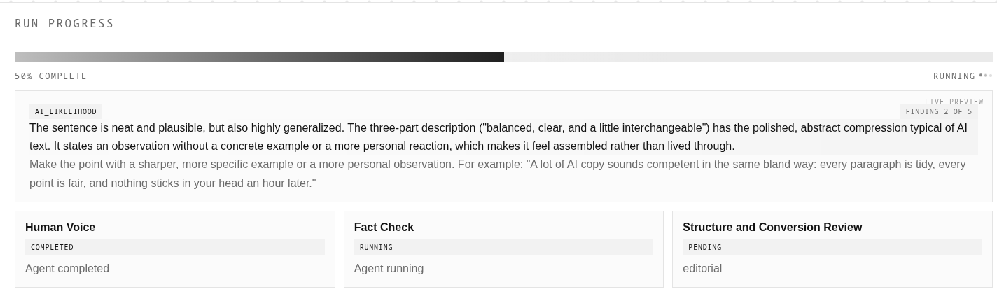 Run progress view with a live preview finding and three agent status cards.